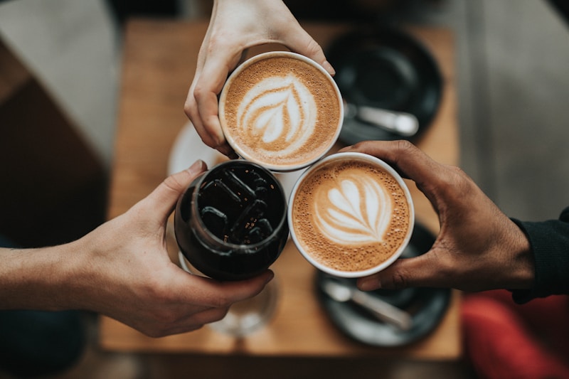 Close-up of espresso pouring into a cup, showing crema and extraction color
