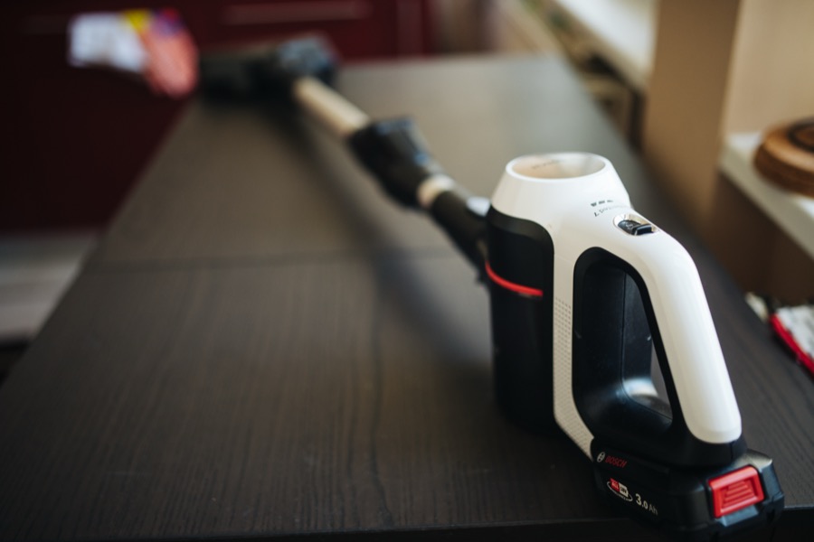 Dyson V15 Detect cordless vacuum cleaning a hardwood floor